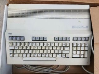 Commodore 128 with 1571 Disk Drive,  Game,  Manuals/Inserts 3