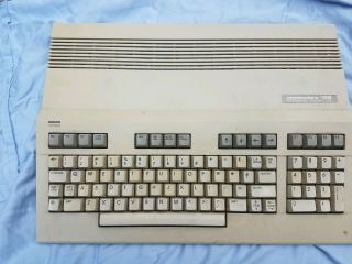 Commodore 128 with 1571 Disk Drive,  Game,  Manuals/Inserts 4