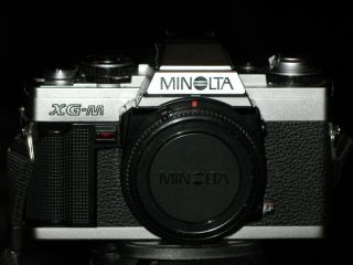 Vintage Minolta XG - M 35mm SLR Camera with 2 Lenses,  Flash and Case 2