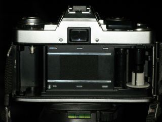 Vintage Minolta XG - M 35mm SLR Camera with 2 Lenses,  Flash and Case 8