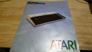 Atari 800XL computer,  AND,  power adapter,  TV Cables 7