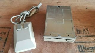 Commodore Amiga 1011,  Roctek RF - 382C,  Chinon FB - 354 external disk drives & mouse 2