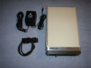 Atari 800 XL XE - - Atari 1050 disk drive in very good,  games 7