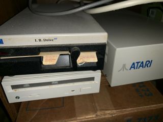 Atari 1040st computer set up,  includes 2 monitors,  external floppy,  hard drives 7