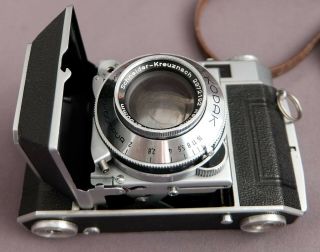 Kodak Retina IIa 35mm rangefinder film camera outfit with Xenon,  filters,  hood, 2