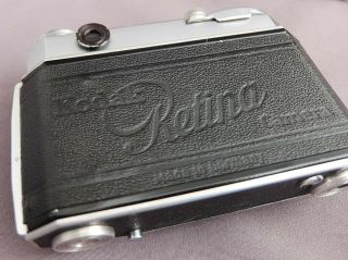 Kodak Retina IIa 35mm rangefinder film camera outfit with Xenon,  filters,  hood, 5