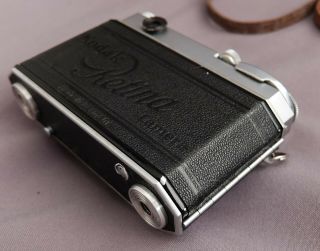 Kodak Retina IIa 35mm rangefinder film camera outfit with Xenon,  filters,  hood, 6