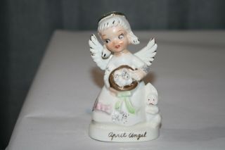 Vintage April Angel Of The Month Figurine Holding Eggs Gold Accent Easter Bunny