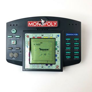 Vintage 1997 Hasbro Monopoly Transaction Electronic Talking Handheld Travel Game