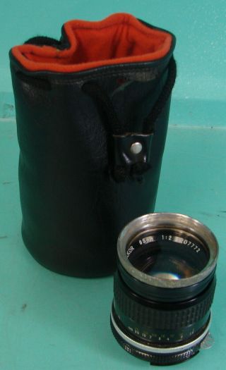 Vtg Nikon Nikkor 85mm Lens 1:2 S/n: 207772 W/ Ednalite Usa No.  713 W/ Leather Bag