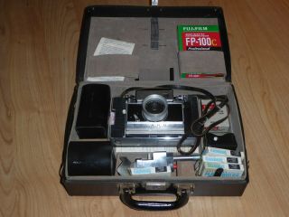 Polaroid Model 180 Camera And Accessories,  Film