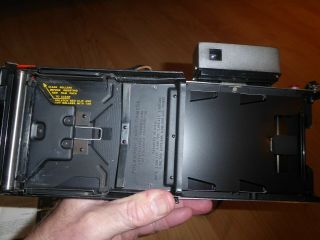 Polaroid model 180 Camera and Accessories,  Film 8