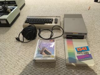 Commodore 64 Personal Computer With 1541 Disk Drive Cords And Manuals -