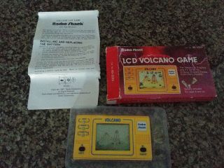 Vintage Radio Shack Lcd Volcano Hand Held Game And Instructions