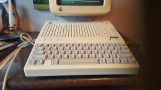 Apple IIC computer,  mouse,  monitor,  extra drive,  modem,  software & manuals 2