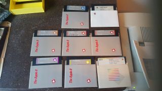 Apple IIC computer,  mouse,  monitor,  extra drive,  modem,  software & manuals 7