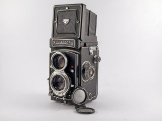 Rolleicord Vb TLR camera with lens shade,  strap,  close - up lens and lens - cap.  Exc 2