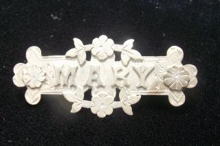 VINTAGE STERLING SILVER BROOCH WITH THE NAME 