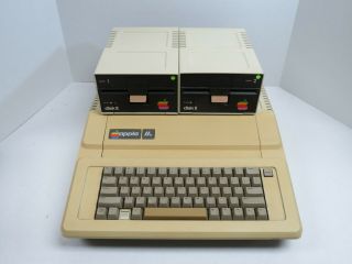 Apple Iie - 128k W/80 Col Card,  Two Disk Ii Drives,  Controllers - 100