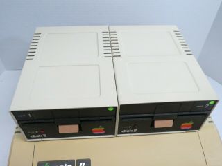 Apple IIe - 128K w/80 Col Card,  Two Disk II Drives,  Controllers - 100 2