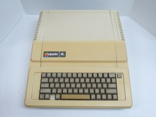 Apple IIe - 128K w/80 Col Card,  Two Disk II Drives,  Controllers - 100 3