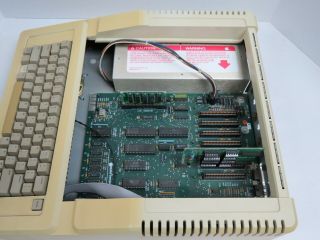 Apple IIe - 128K w/80 Col Card,  Two Disk II Drives,  Controllers - 100 6