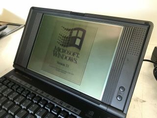 HP Omnibook 425 Handheld / Mini Laptop 486 with 5MB RAM,  634MB Flash/HDD Win 3.  1 4