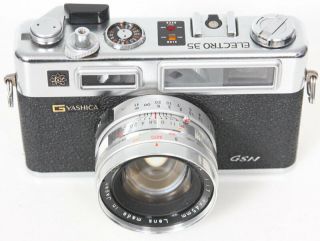 Yashica Electro 35 Camera With Auxiliary Lenses,  Case,