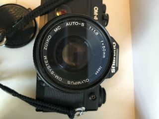 Olympus OM - 4 Black Film Camera w/ Zuiko MC Auto - S 50mm F1:1.  8,  3 lenses 8
