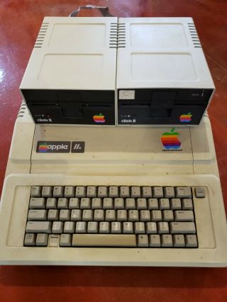 Apple Iie Computer With 2 Disk Drives And A Macintosh Classic Ii