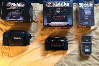 Nishika N8000 3 - D 35mm Camera,  Nishika Twin Light 3000,  Camera Case All Cib.