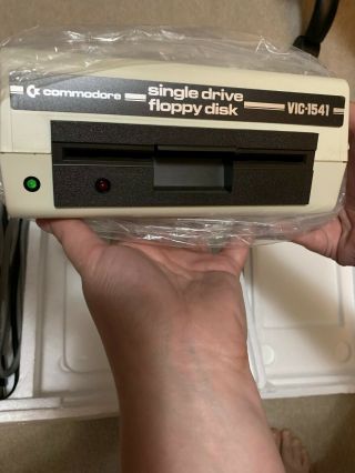 Commodore 64 Computer - with floppy disk drive and manuals 8