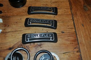 3 Rolleiflex 3.  5 F TLR Camera Name Plates,  6 diffusor plates,  two knobs,  plus 4