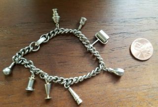 Vintage Silver Emco Charm Bracelet With 8 Charms Including A Bowling Pin
