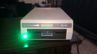 Commodore 1541 Floppy Disk Drive.  Blank Disks