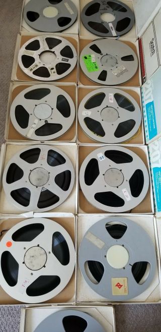 11 Reel to Reel Tapes.  7 Aluminum and 4 Plastic 10.  5 inch recorded music. 11
