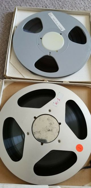 11 Reel to Reel Tapes.  7 Aluminum and 4 Plastic 10.  5 inch recorded music. 9
