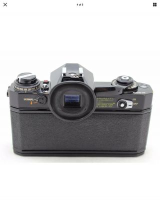 Canon EF vintage 35mm SLR camera,  lens FD 50mm 1: 1.  8 S.  C. 2