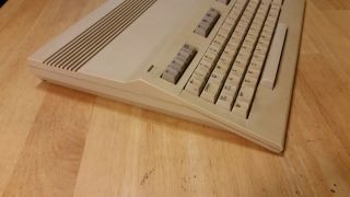 Commodore 128 computer,  1571 drive,  cords 150,  Disks,  Printer 9