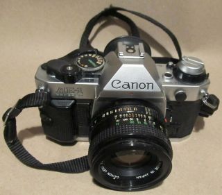 Canon Ae1 Program 35mm Slr Camera Fd 50mm 1:1.  8 Lens With Lens Caps & Strap