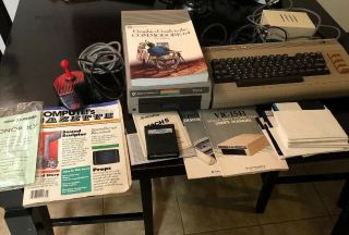 Commodore 64 computer,  1541 Disk Drive,  Music Composer,  Joystick,  Manuals,  Cords 2
