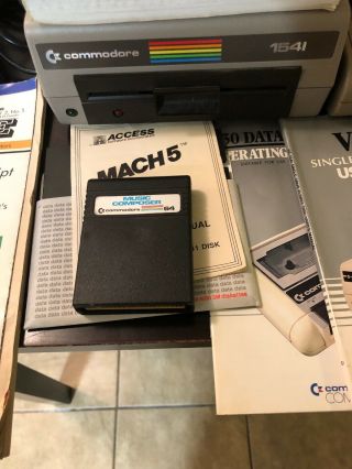 Commodore 64 computer,  1541 Disk Drive,  Music Composer,  Joystick,  Manuals,  Cords 6