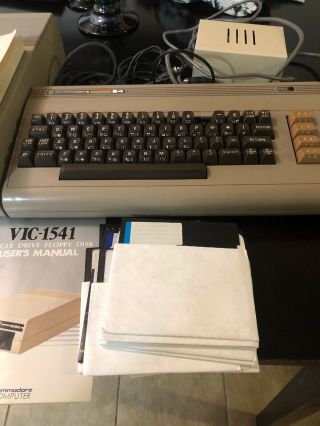 Commodore 64 computer,  1541 Disk Drive,  Music Composer,  Joystick,  Manuals,  Cords 7