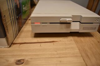 Commodore 64 K computer with Commodore 1571 floppy drive 7