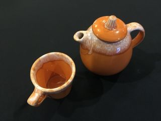 Vintage Hull Pottery tangerine/orange cup and tea oitcher 2
