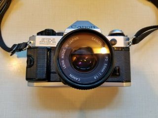 Canon AE - 1 Program 35mm SLR Camera w/50mm f/1.  8 Lens & Sunpak 1000 Flash & Case 2
