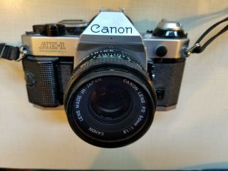 Canon AE - 1 Program 35mm SLR Camera w/50mm f/1.  8 Lens & Sunpak 1000 Flash & Case 3
