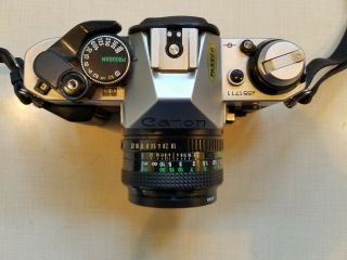 Canon AE - 1 Program 35mm SLR Camera w/50mm f/1.  8 Lens & Sunpak 1000 Flash & Case 4