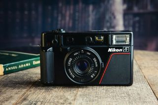 Nikon L35 AF 35mm Film Camera.  1000 ISO Version.  Battery. 4