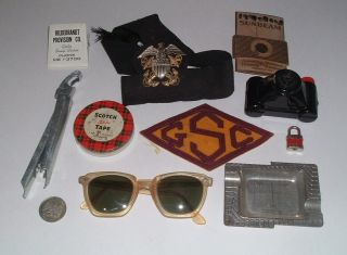 JUNK DRAWER of vintage stuff,  pocket knives,  lighter,  tins,  cars,  camera,  pins 3